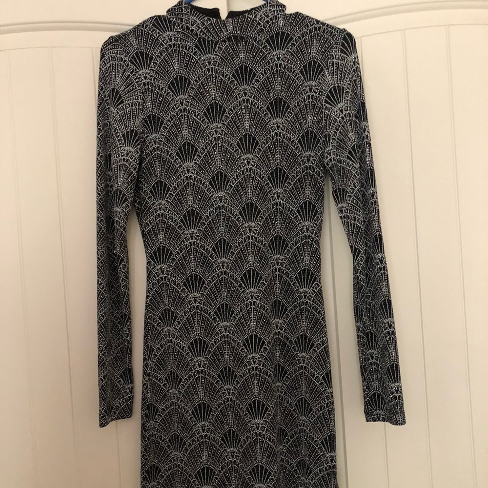 Shimmery bod-con Dress open Back.